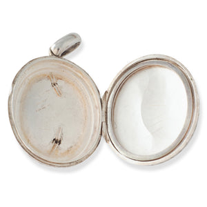 A Silver Locket with Cross