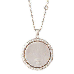 A Round Silver Locket with Chain