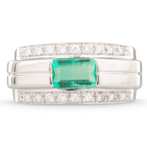 An Emerald and Diamond Ring