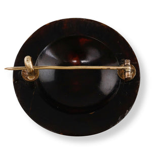 A Circular Pique Brooch