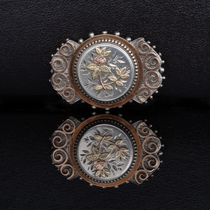 A Victorian Silver and Gold Brooch