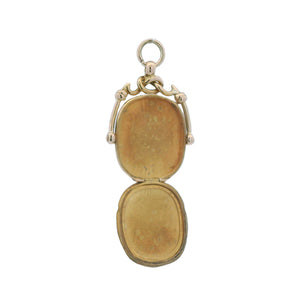 A Spinning Gold Heart Locket